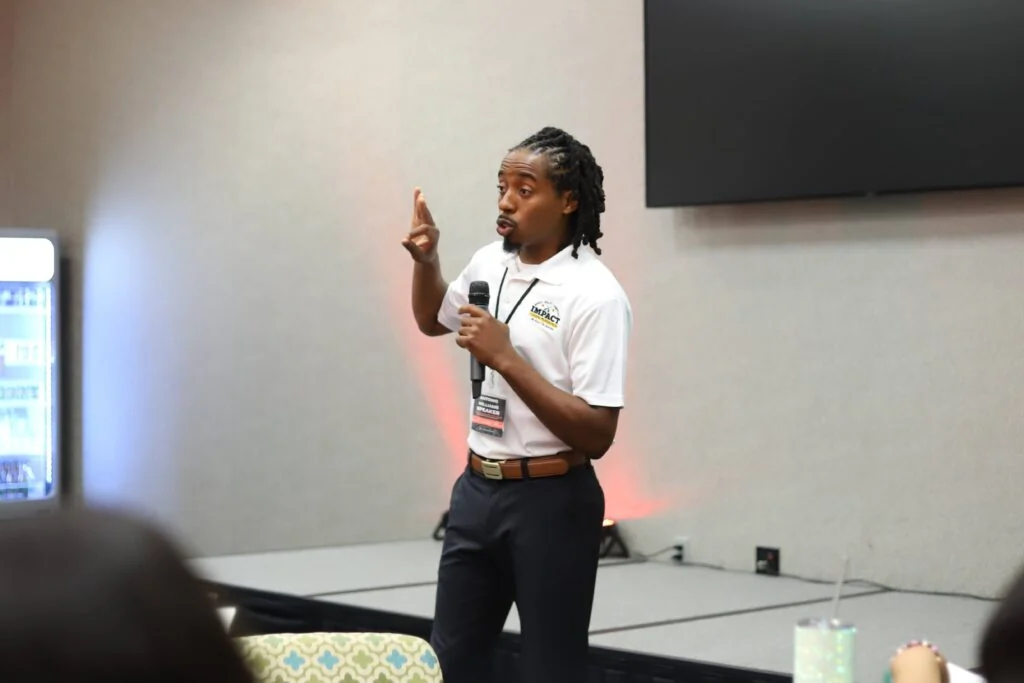 Toni Williams engaging participants during a leadership workshop